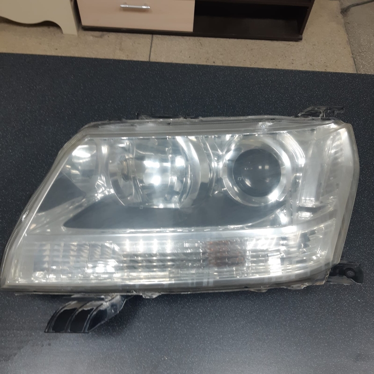Фара SUZUKI Grand Vitara TDA4W 2008 Перед.Лев. (Контрактный)